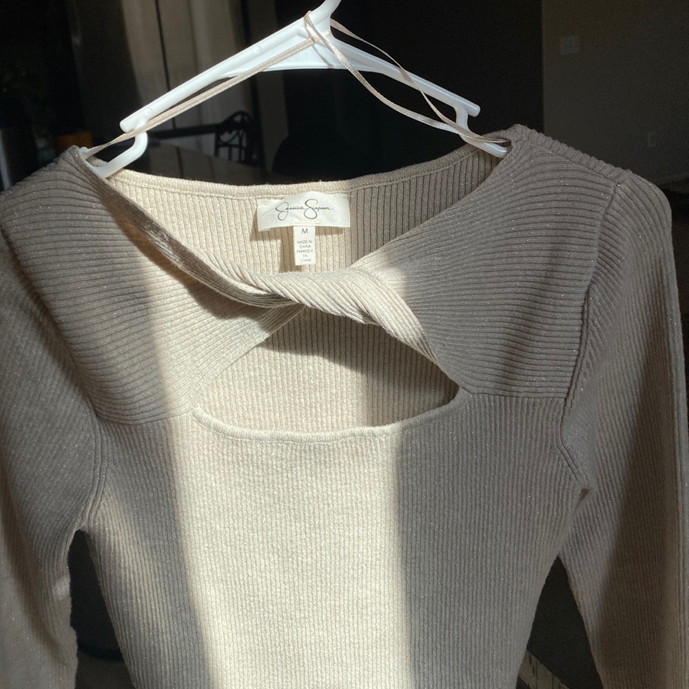 Cute top with gold glitter in a size Medium